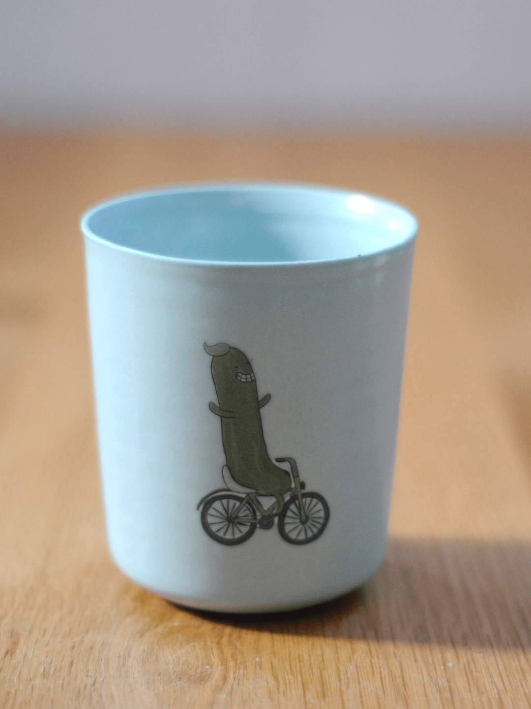 כוס עם דקאל רבטוס וקאמבר על אופניים - גדול
