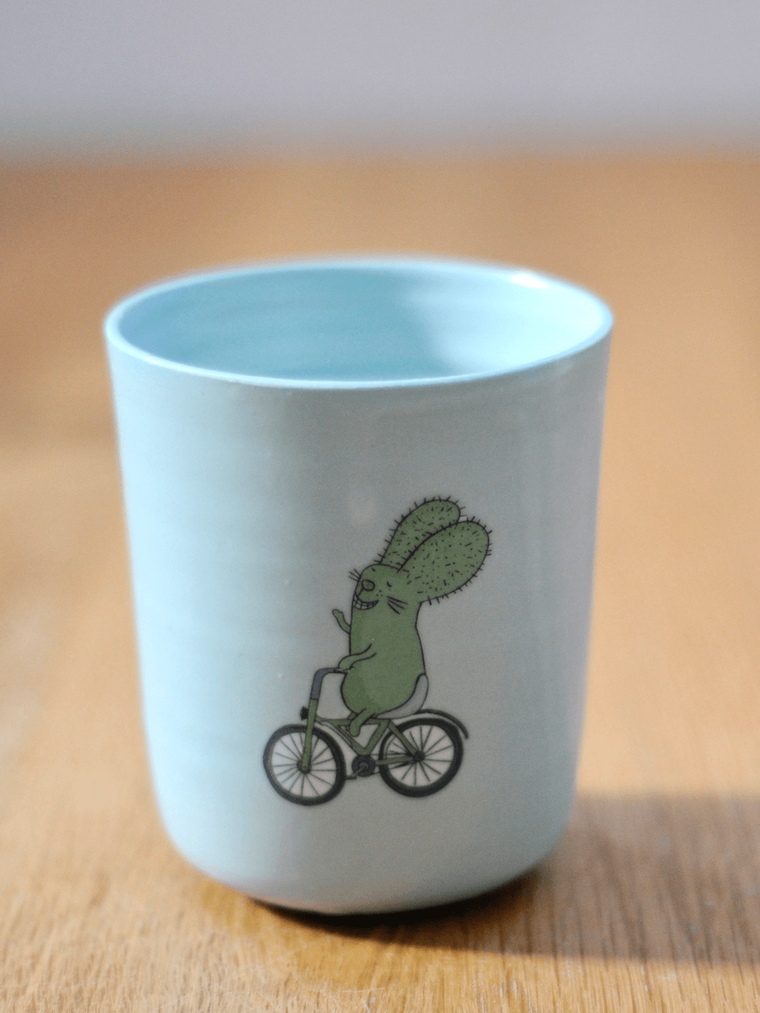 כוס עם דקאל רבטוס וקאמבר על אופניים - גדול